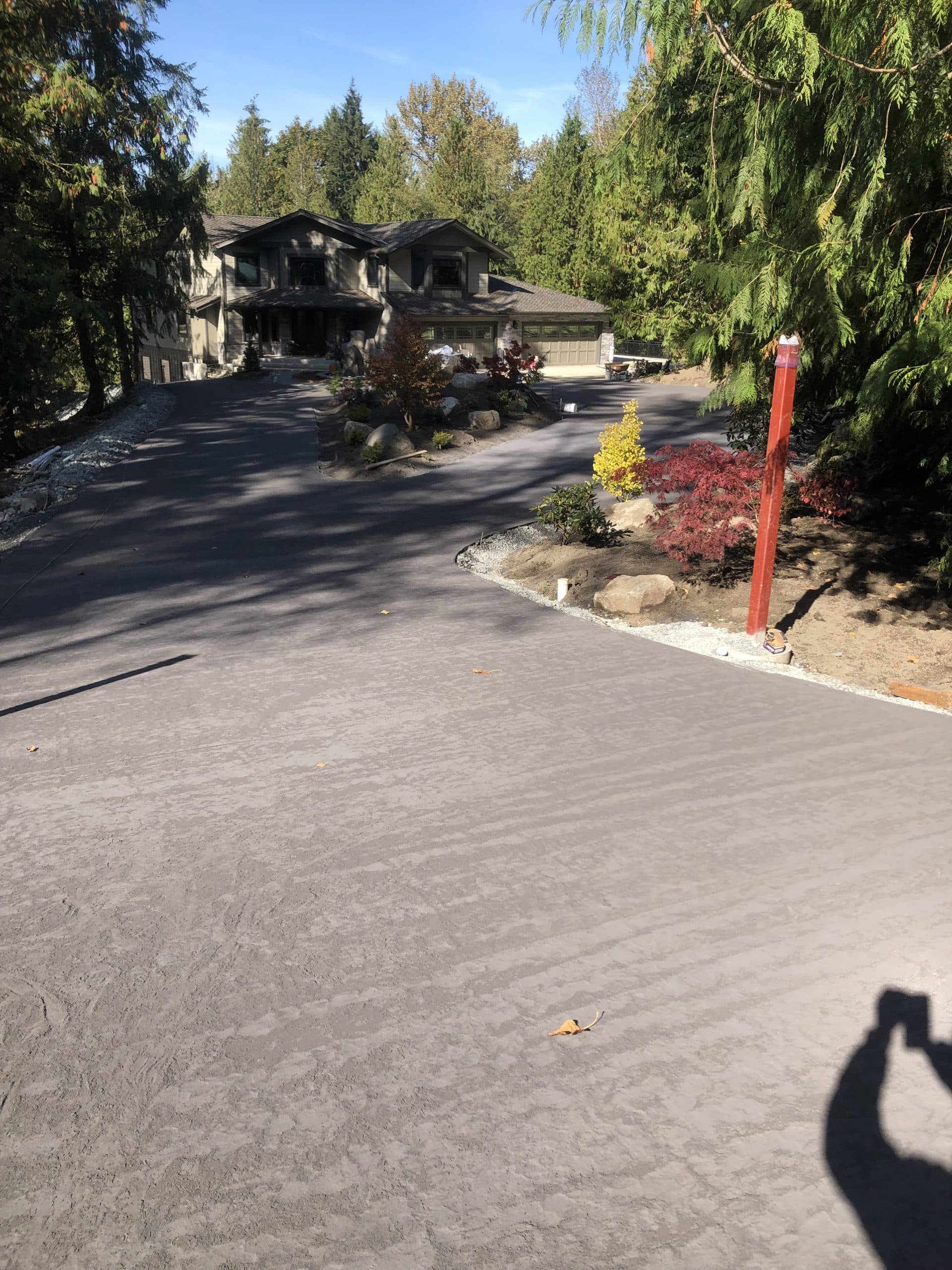 A freshly poured and finished stamped concrete driveway in Snohomish, Washington.